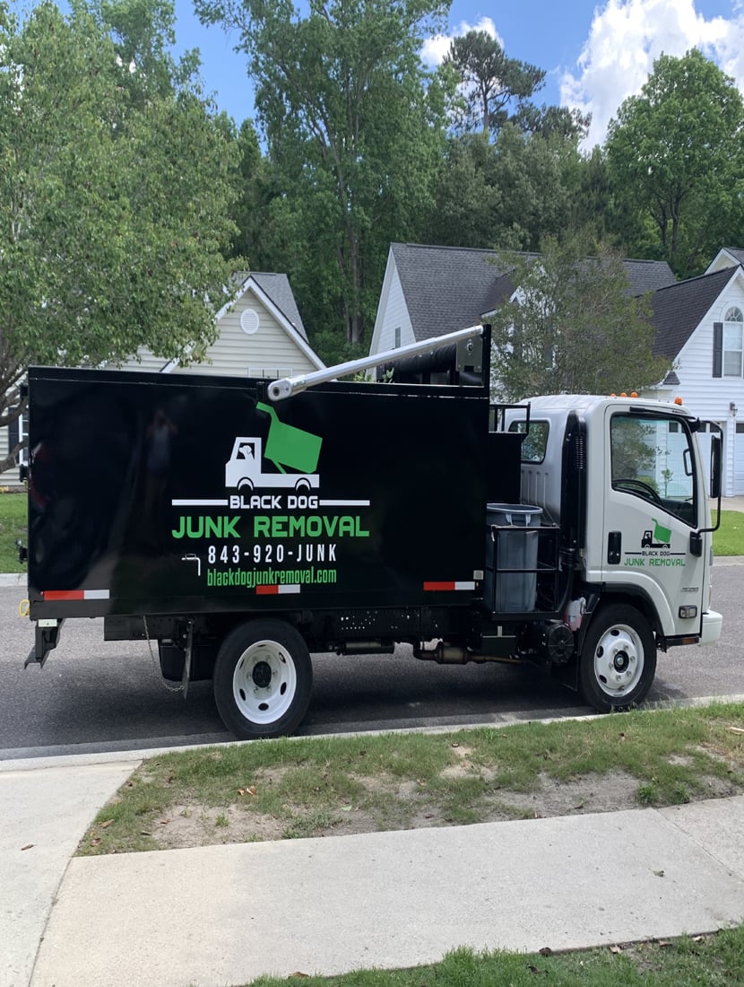 Junk Removal Team Loading Truck